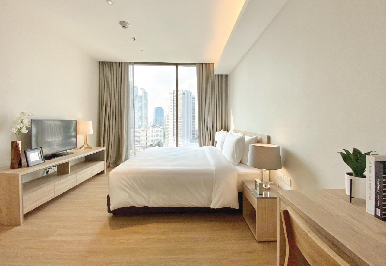 Oakwood Suites Bangkok Zewnętrze zdjęcie A bedroom at the hotel
