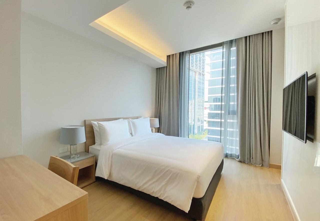 Oakwood Suites Bangkok Zewnętrze zdjęcie A bedroom at the hotel